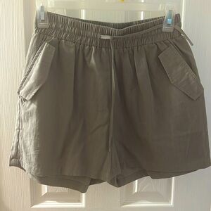 Light weight grey/green shorts. Never worn. Size Small